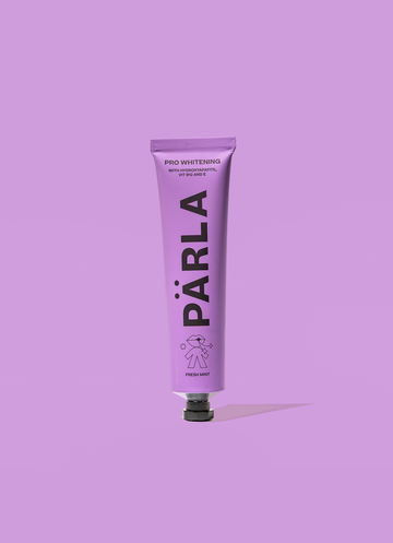 PARLA Pro Whitening — wybielająca pasta do zębów z hydroksyapatytem, tubka 75 ml — przód
